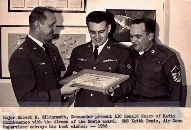Major Robert E. Wildermuth, Commander, presents the Airman of the Month award, 1966.