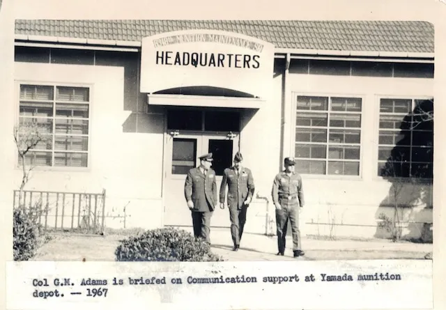 Col G.M. Adams briefed on communication support at the Yamada munition depot, Japan, 1967.