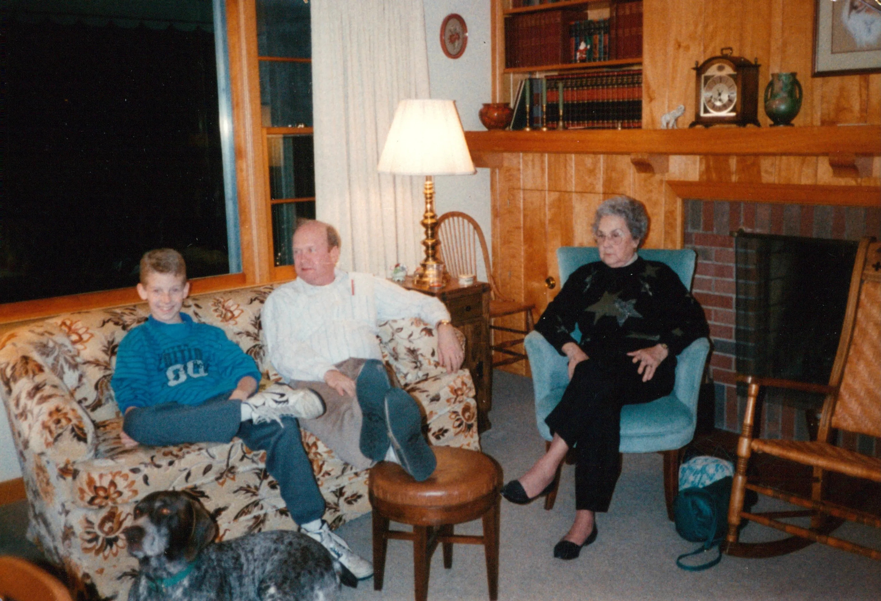 Young Chuck on the couch with what appears to be a sprained ankle — c. 1985–1990