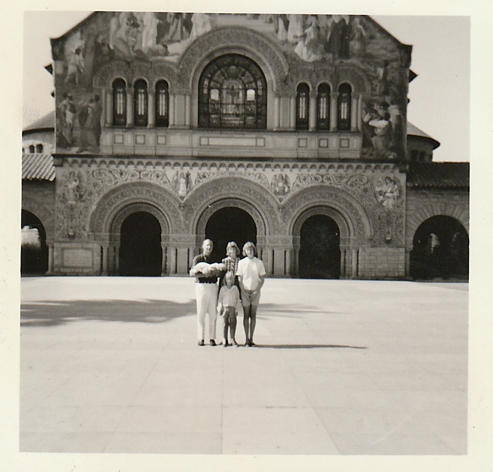 Family at the façade of Stanford Memorial Church — likely a return visit to campus after Robert Earl had moved on to the rest of his career. People not yet definitively identified; tentatively Robert Earl holding a baby (possibly a grandchild), Dottie, Terrie Lee, and one other child. Chuck to confirm.