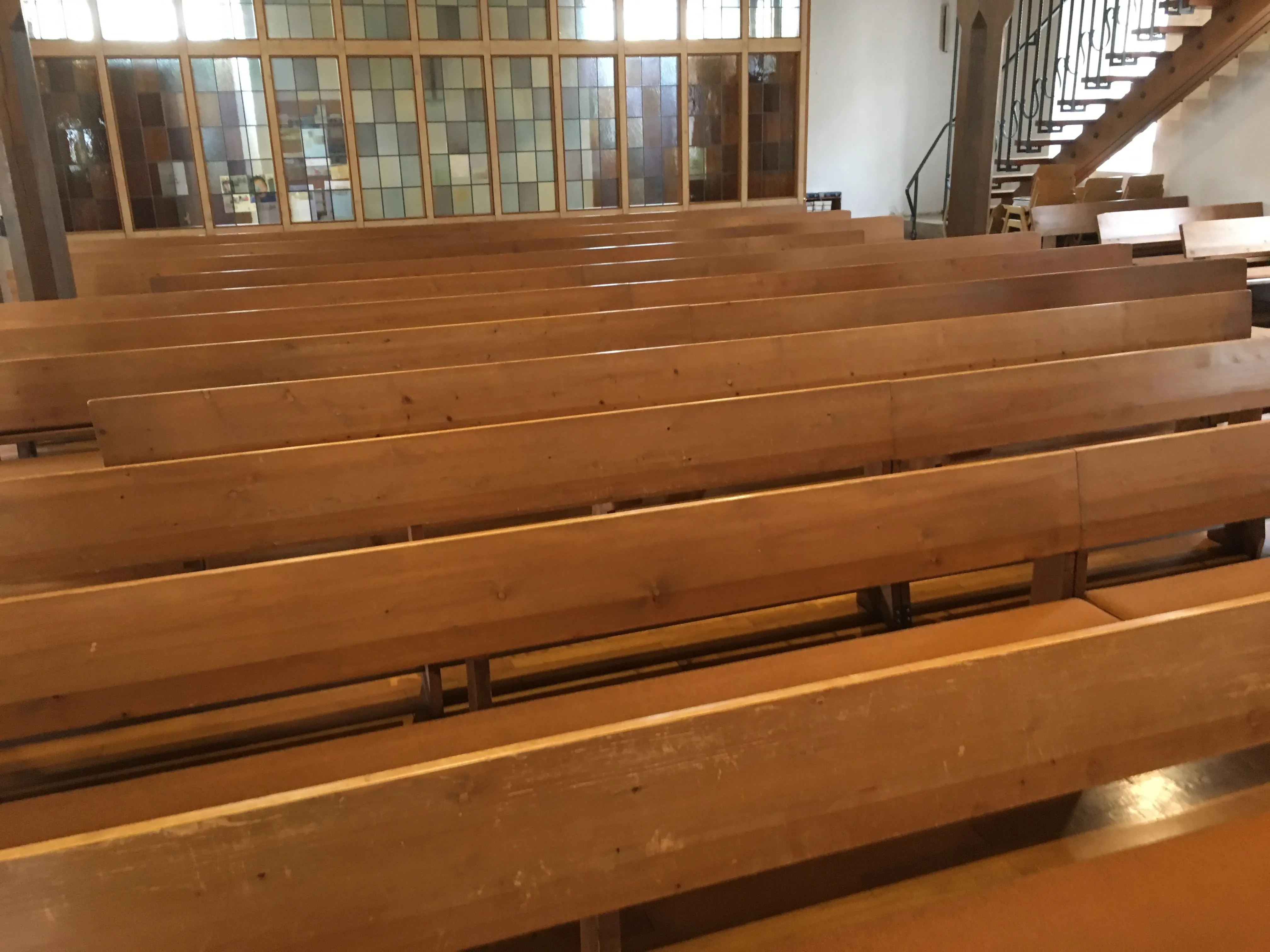 The interior — pews, nave, pulpit — that grandpa could not photograph in 1992. Three additional Chuck frames from the 2018 visit.
