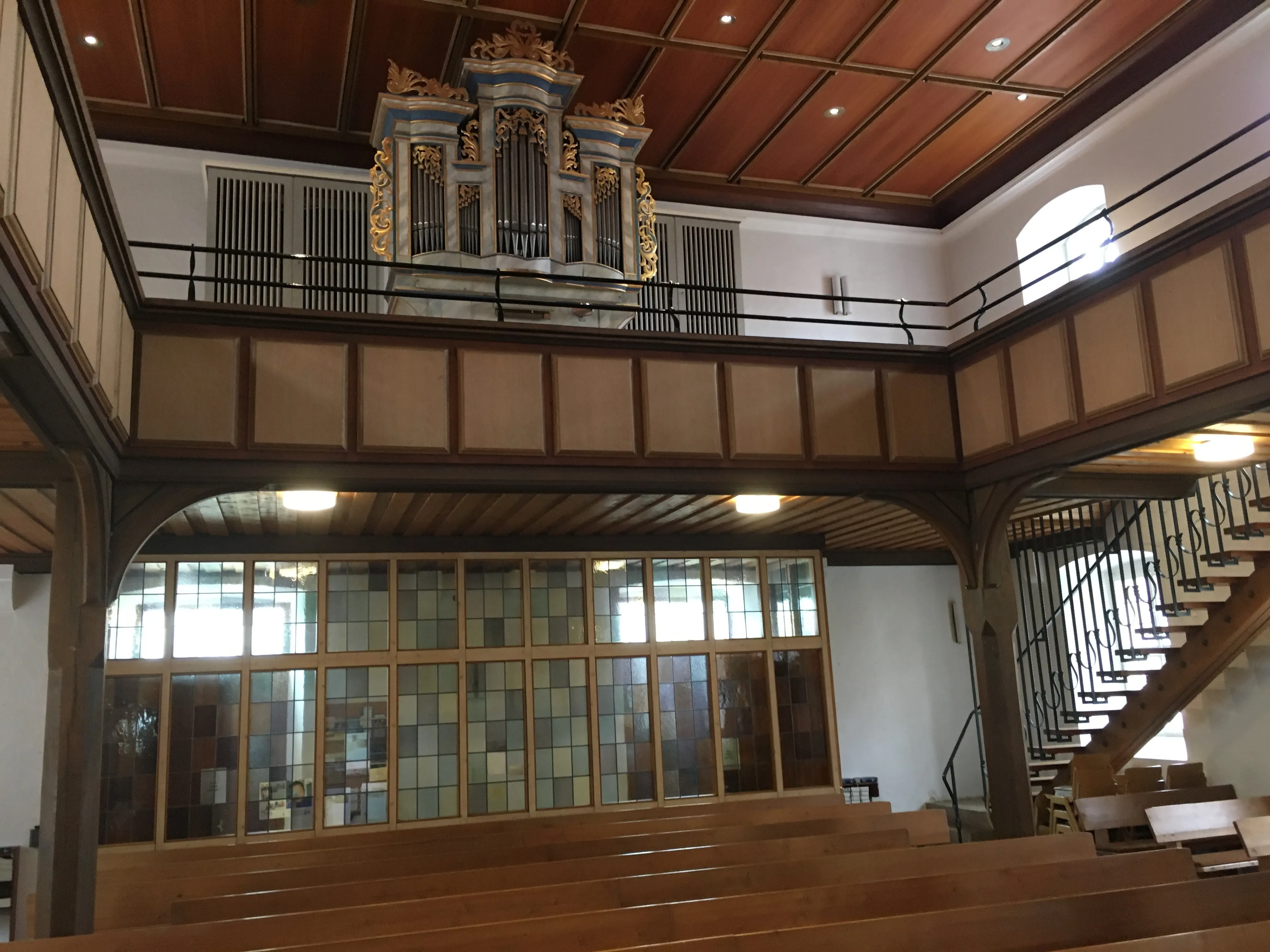 The interior — pews, nave, pulpit — that grandpa could not photograph in 1992. Three additional Chuck frames from the 2018 visit.
