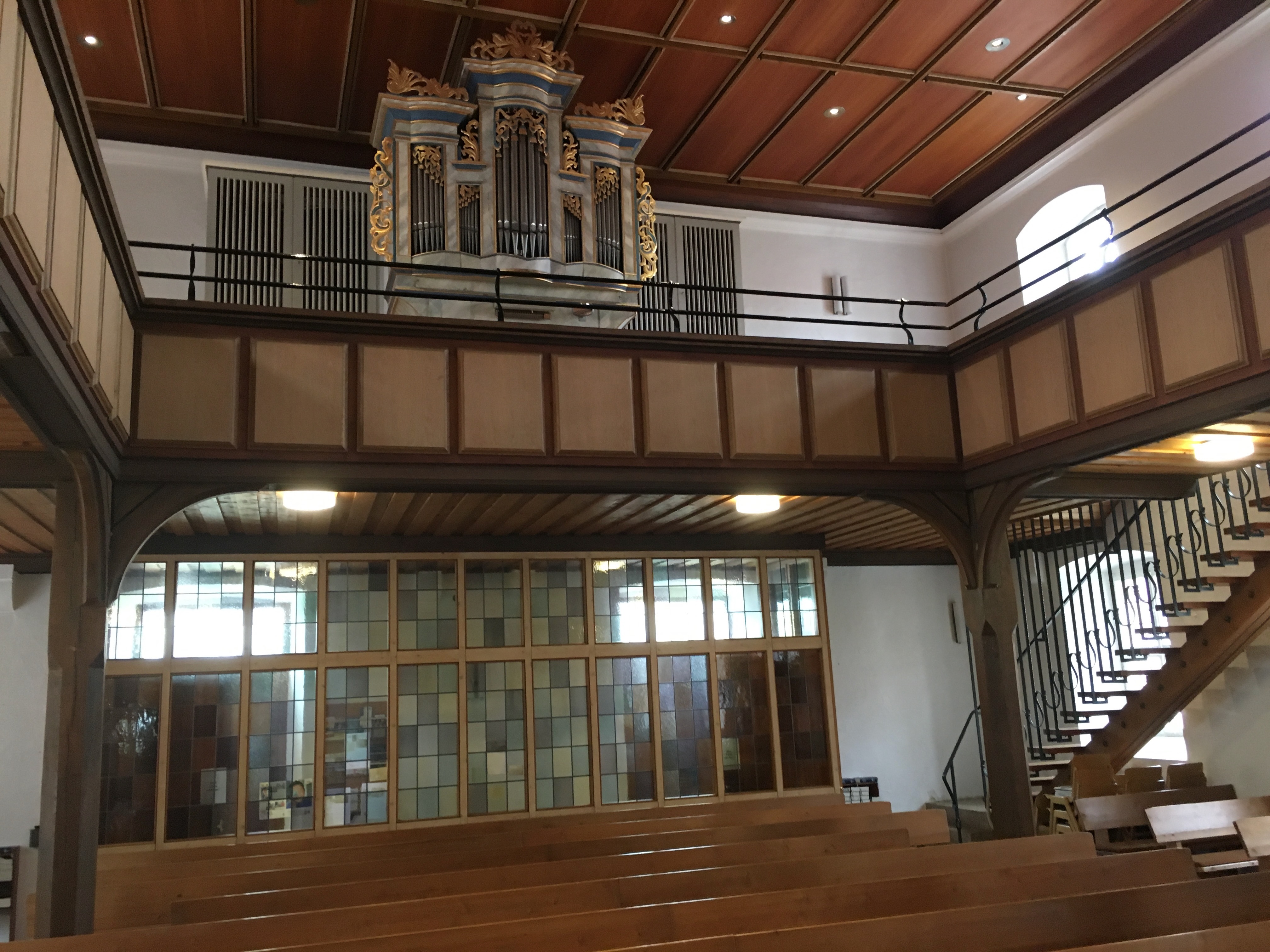 The interior — pews, nave, pulpit — that grandpa could not photograph in 1992. Three additional Chuck frames from the 2018 visit.