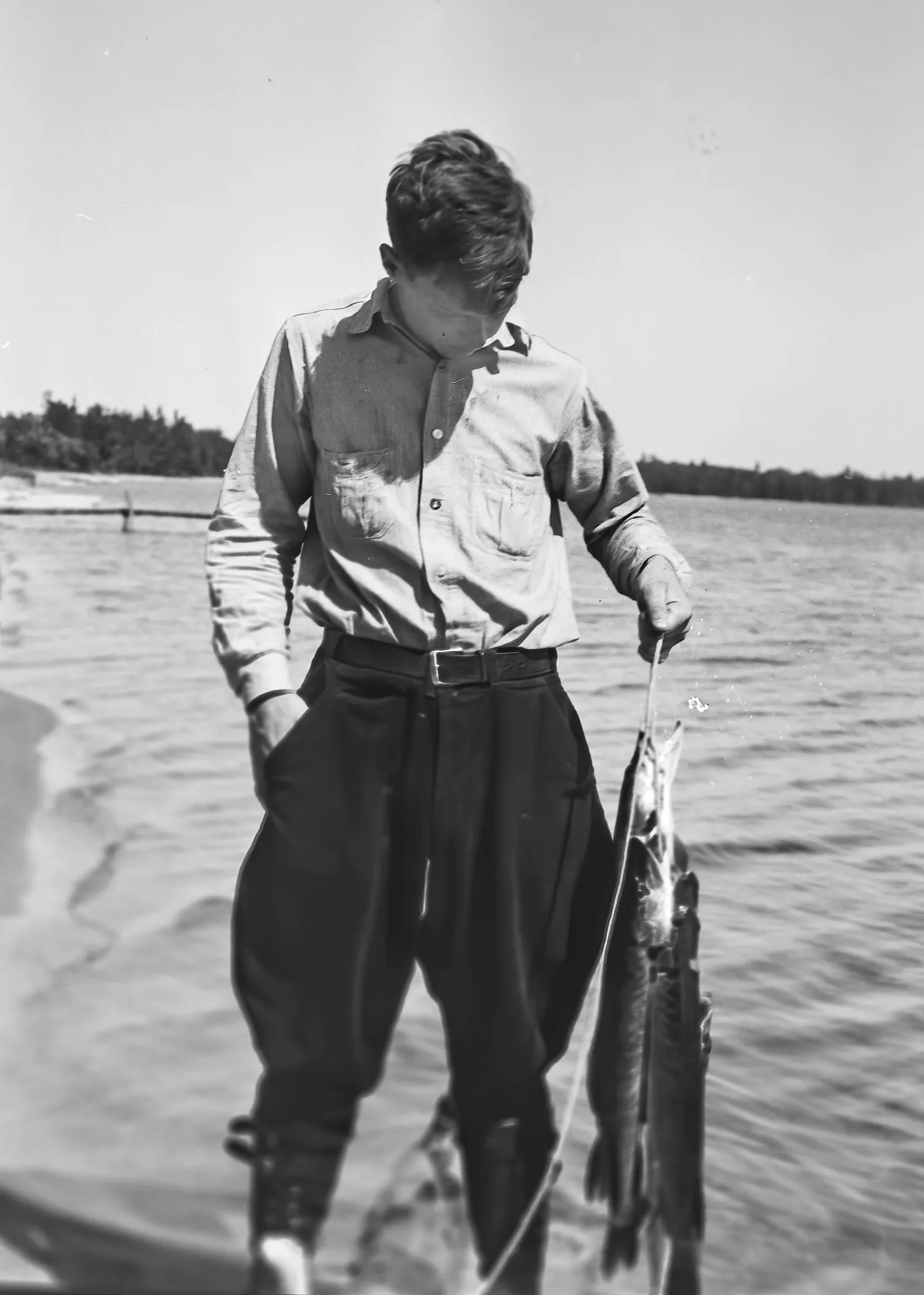 Will Eesley with a string of fish — Black Lake, Michigan, c. 1929 (age 19)