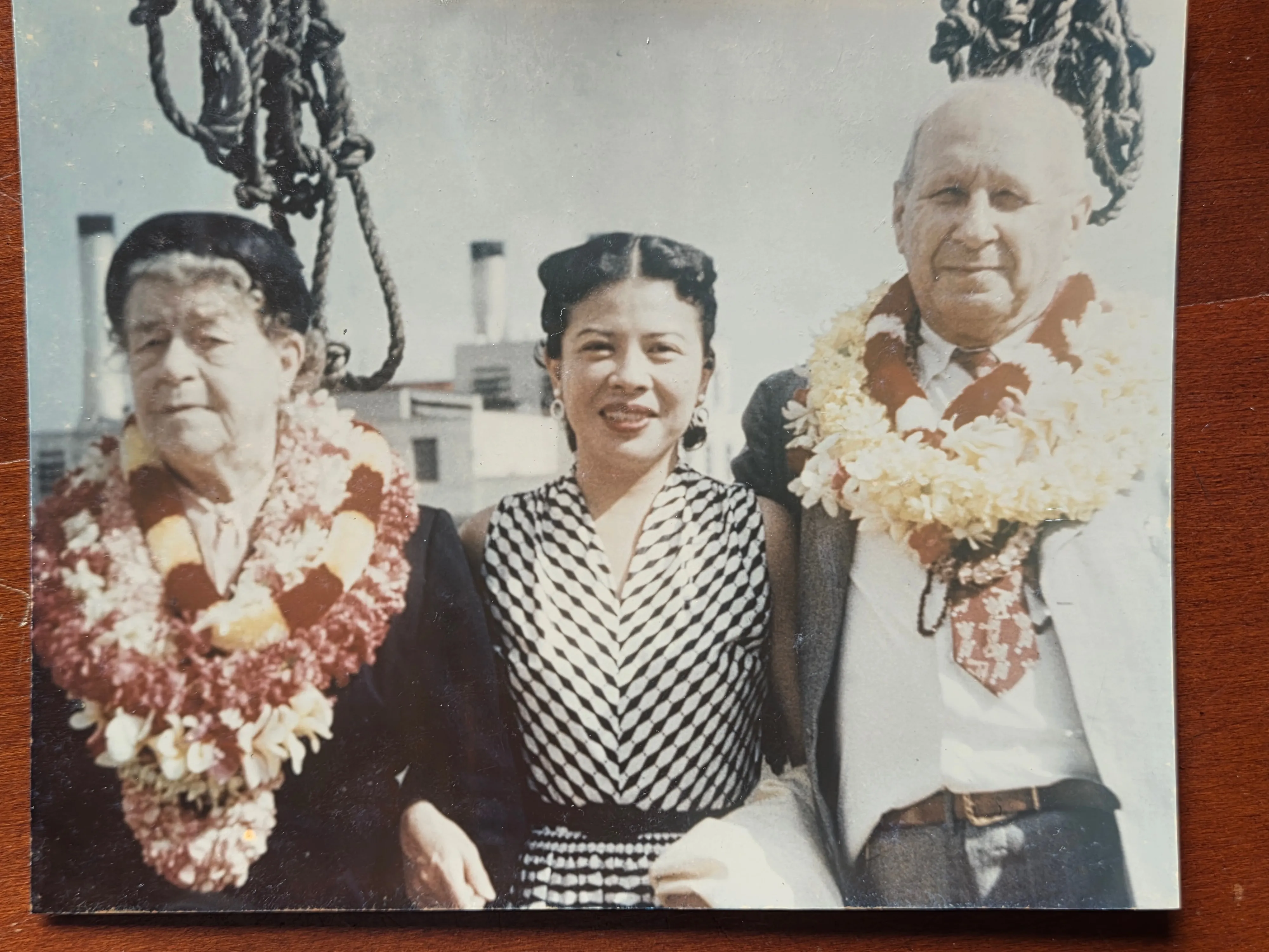 Charles Leonard and Lillie Dale Eesley with Stella in Honolulu, 1953, on the 50th anniversary of their 1903 marriage. The leis around their necks are the welcome leis given to disembarking passengers in mid-twentieth-century Hawaii.
