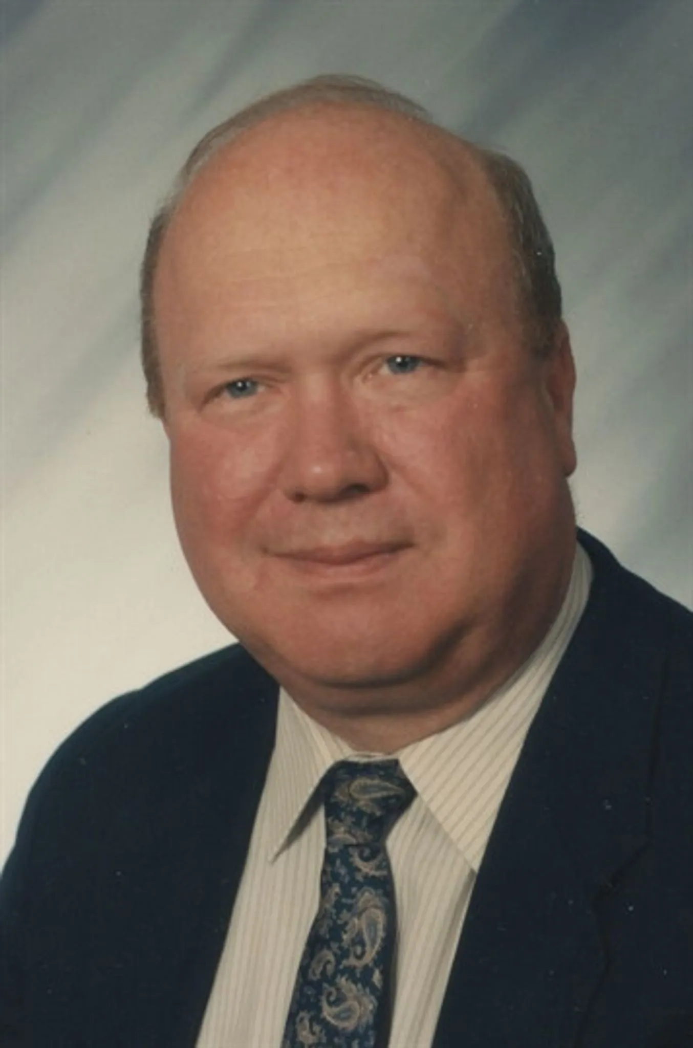 Charlie Eesley in a later studio portrait, c. 1990s — the photograph used in his 2015 obituary.
