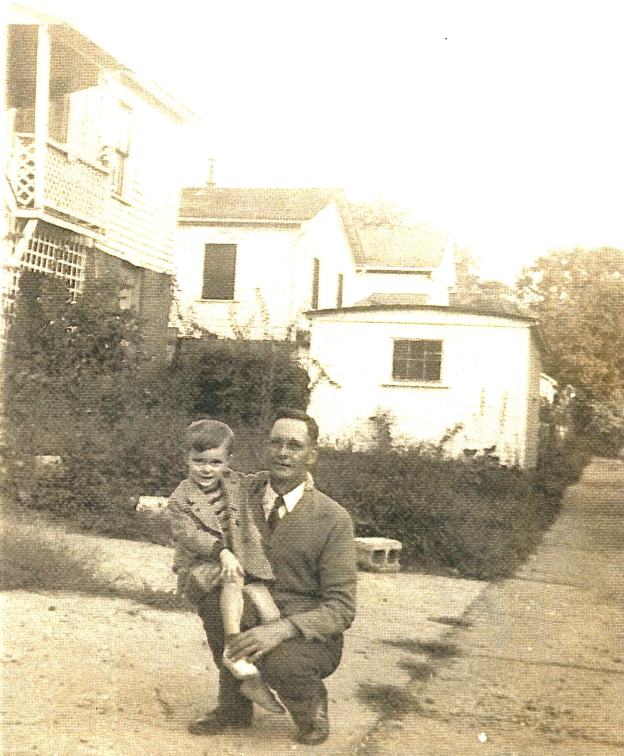Homer Davis with his son William Harvey Davis Sr. on his knee, c. 1944-1945. From Chuck's keeping.