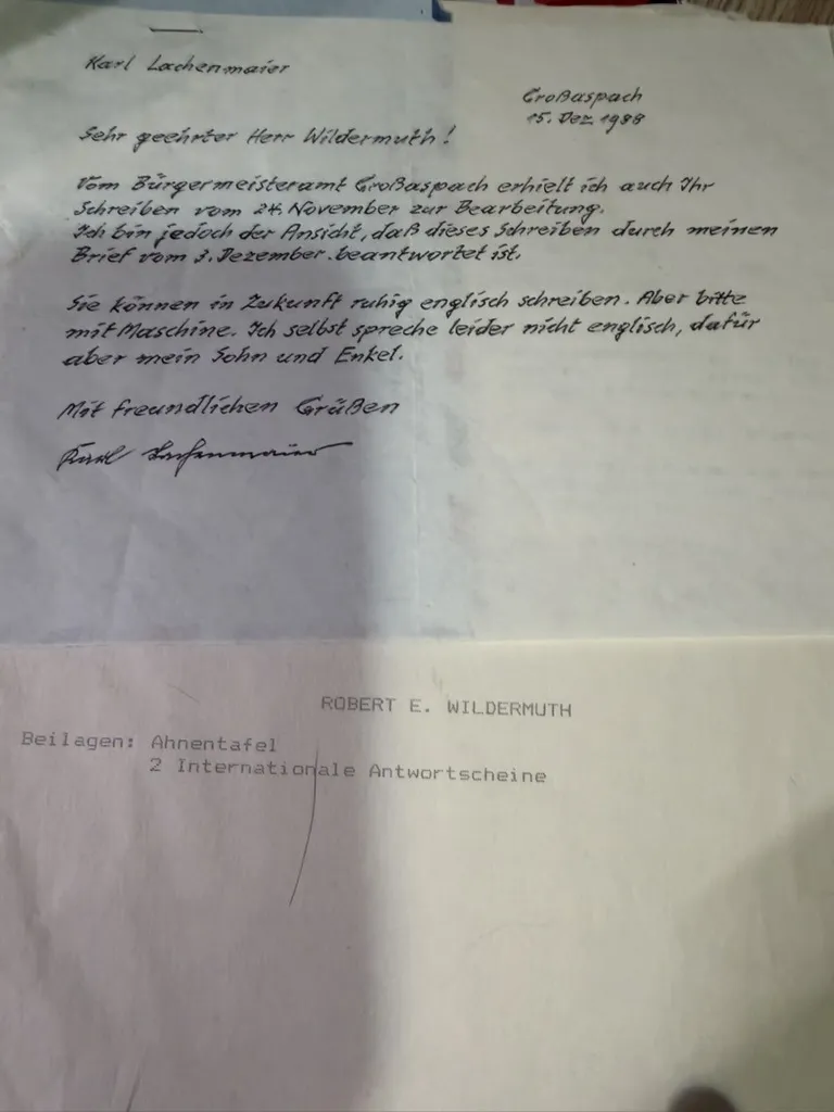 A handwritten letter in German from Karl Lachenmaier, Grossaspach, dated 15 December 1988, saying that the mayor’s office passed him Mr Wildermuth’s letter of 24 November but that he considers it already answered by his own letter of 3 December, and telling him he may write in English in future provided it is typed, since he himself does not speak English but his son and grandson do.