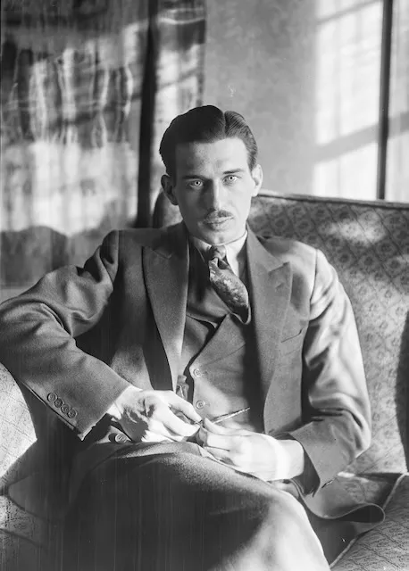 Leonard David Eesley, Spring 1929 — a young man of about twenty-four, seated in a three-piece suit.
