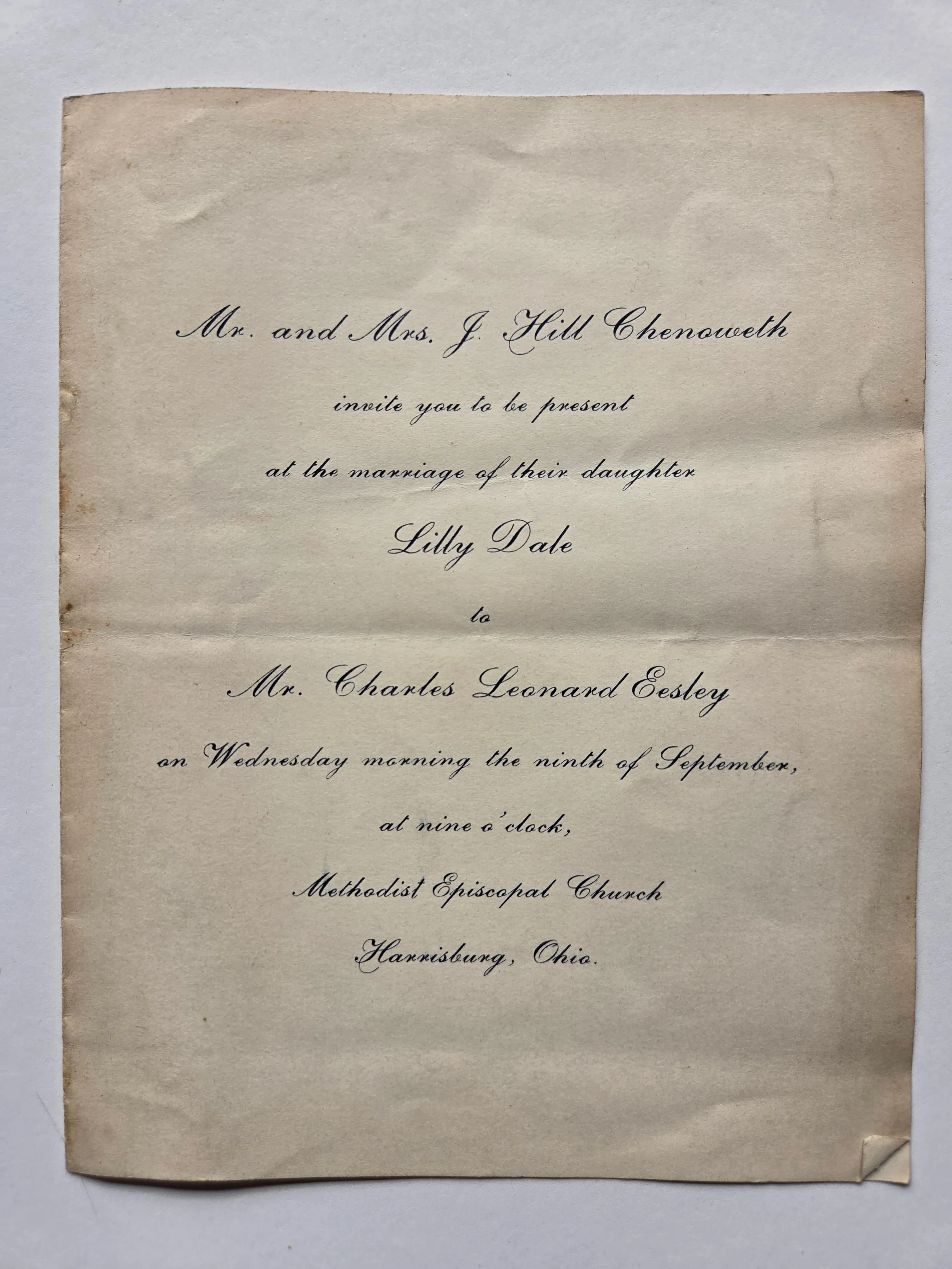 The 1903 engraved wedding invitation for Lilly Dale Chenoweth and Charles Leonard Eesley.