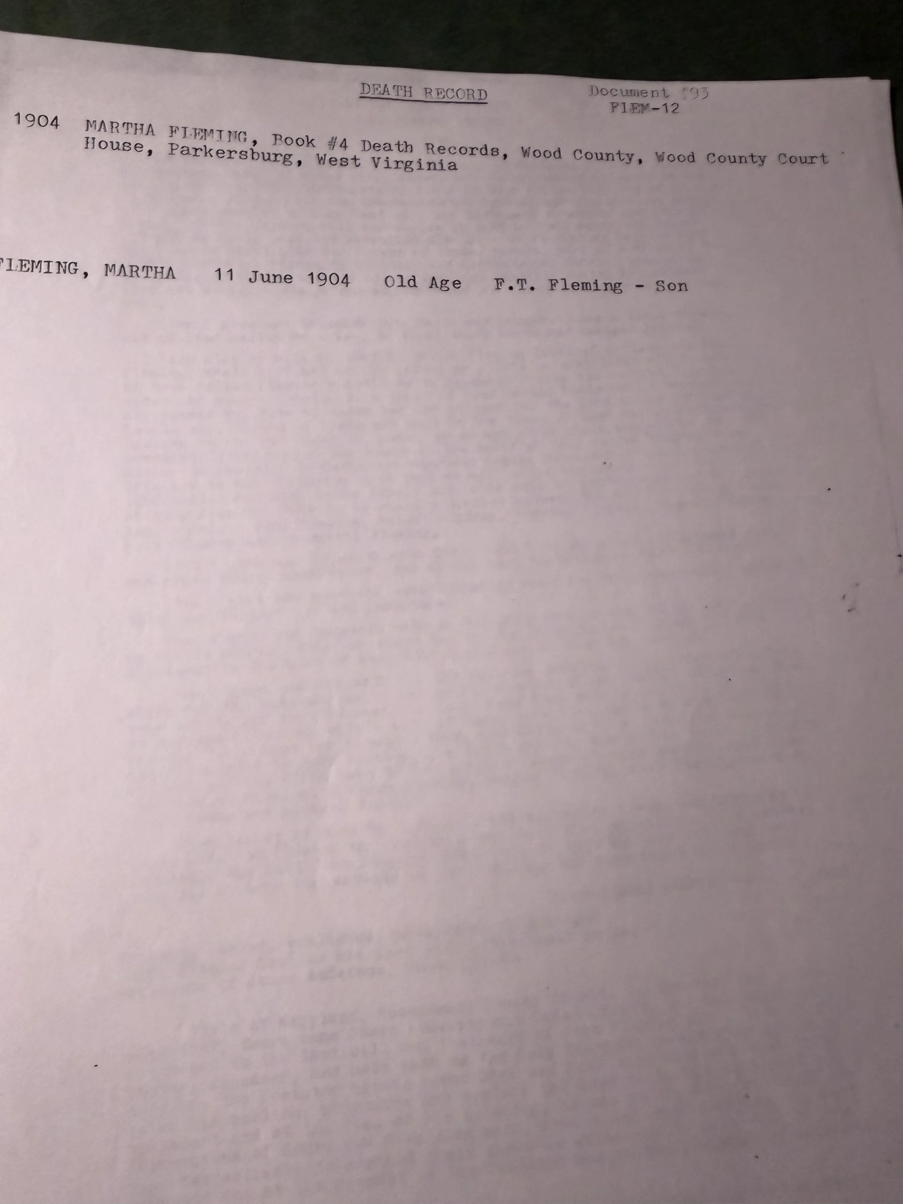 A typed abstract headed Death Record, Document 93, FLEM-12, recording Martha Fleming, 11 June 1904, cause old age, informant F. T. Fleming, son, from Book 4 of the Wood County death records at the courthouse in Parkersburg.