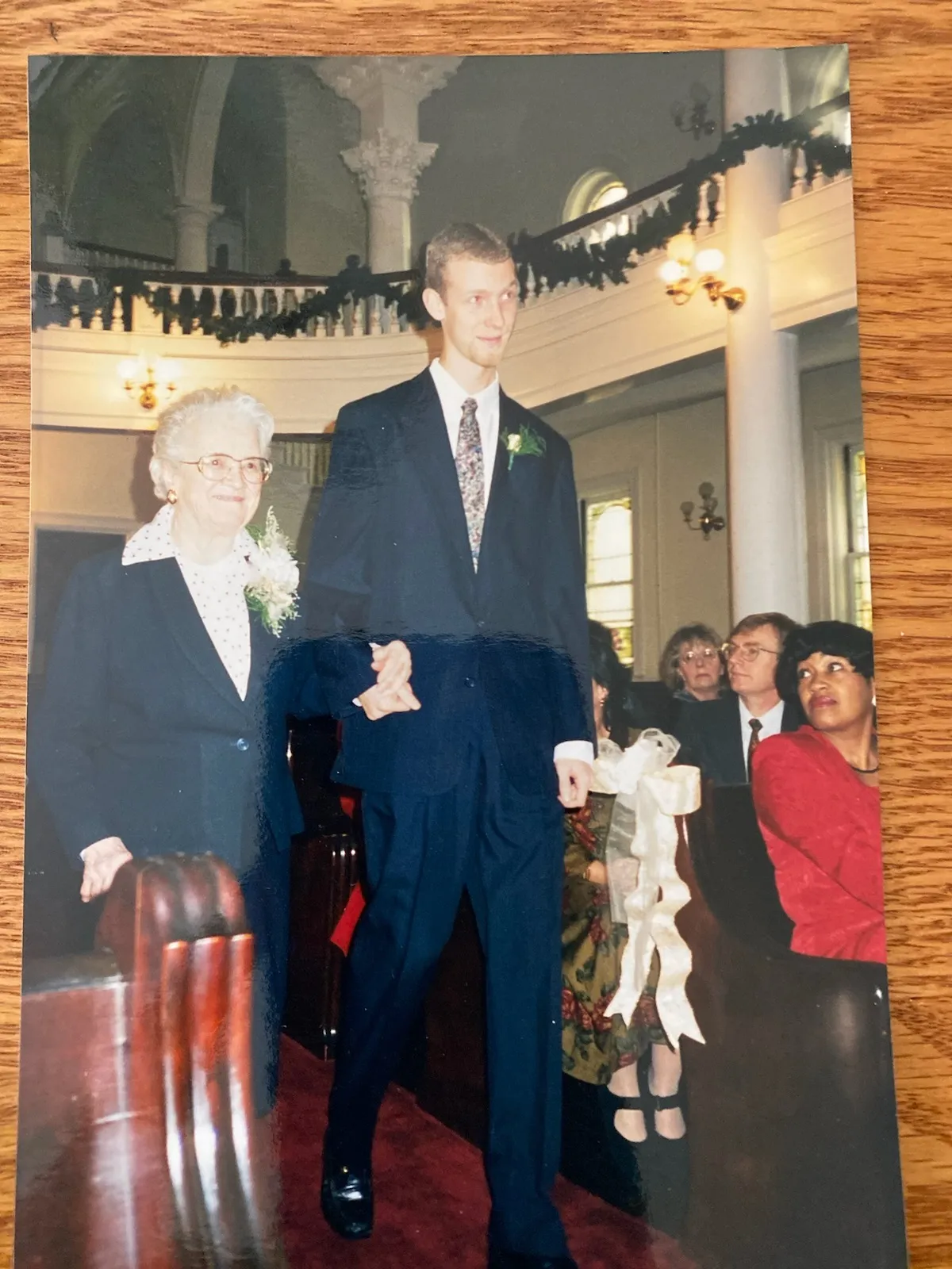 Peggy Eesley on the arm of her grandson Chuck, walking down the aisle at her son Charlie's wedding to Diana, early 2000s.