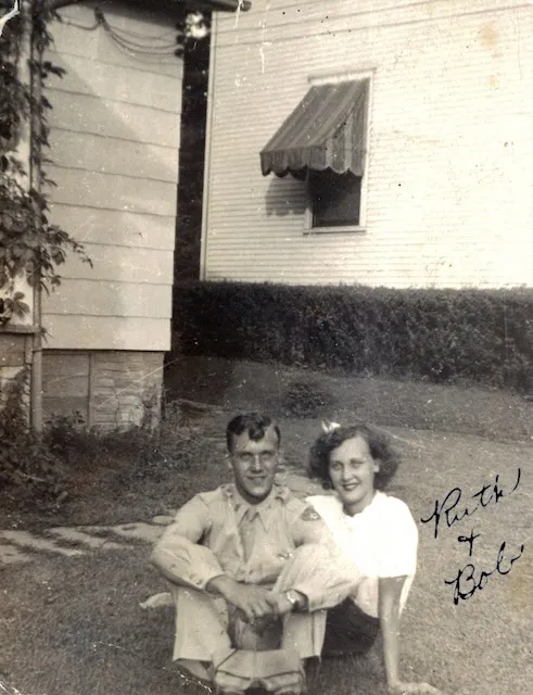 Ruth Wildermuth, at right, with her younger brother Bob — Robert Earl Wildermuth — in his Army uniform, c. 1943–44, on a Marietta lawn; the print is signed "Ruth & Bob."