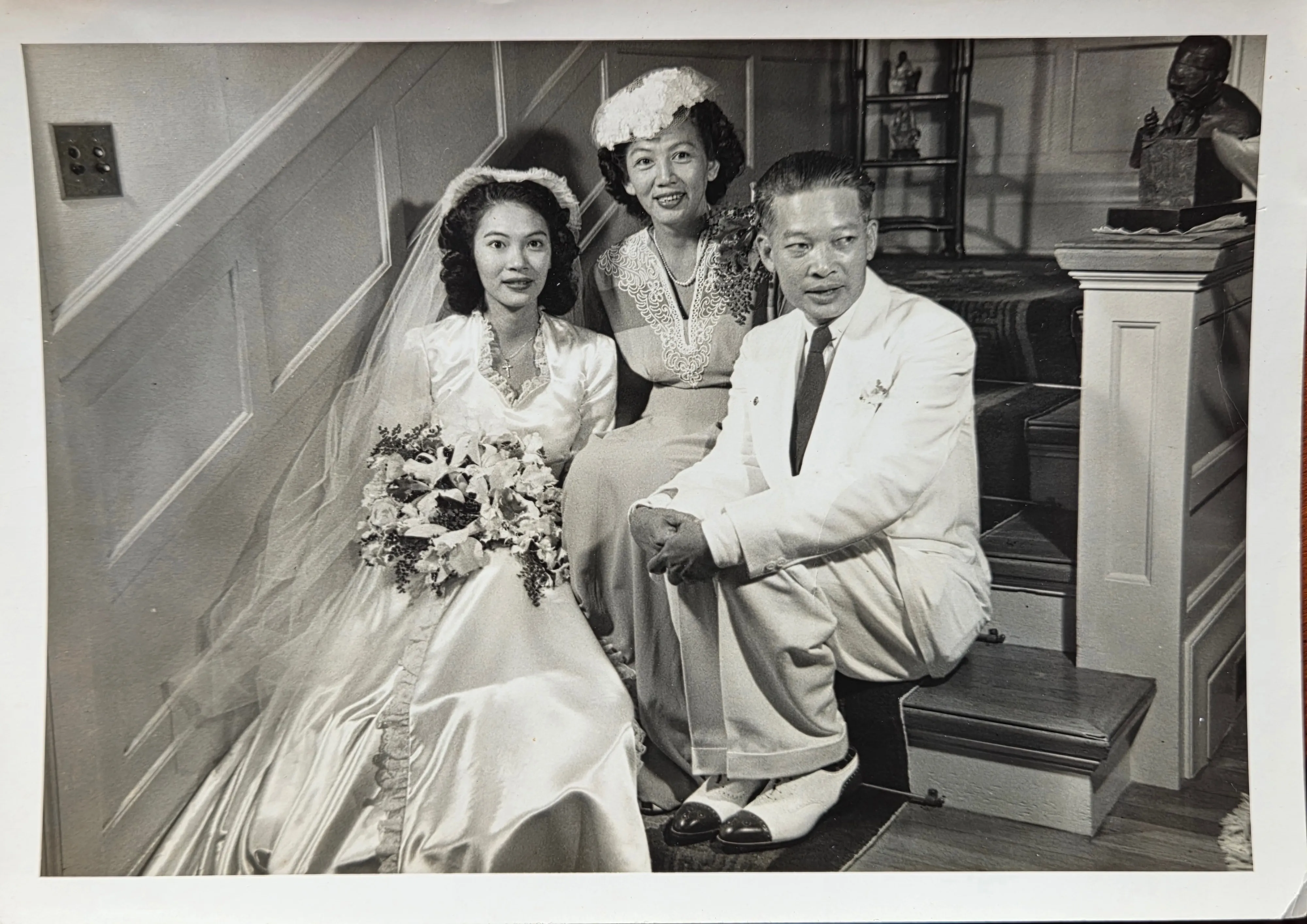 Stella Chong on her wedding day, with family — c. April 1945